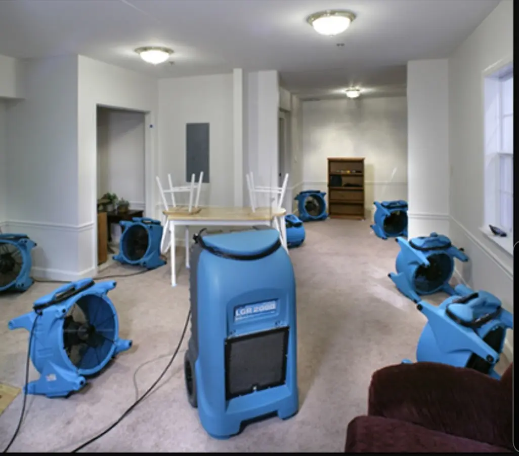 Air movers and dehumidifier setup for Water Damage Restoration in Brushy Creek